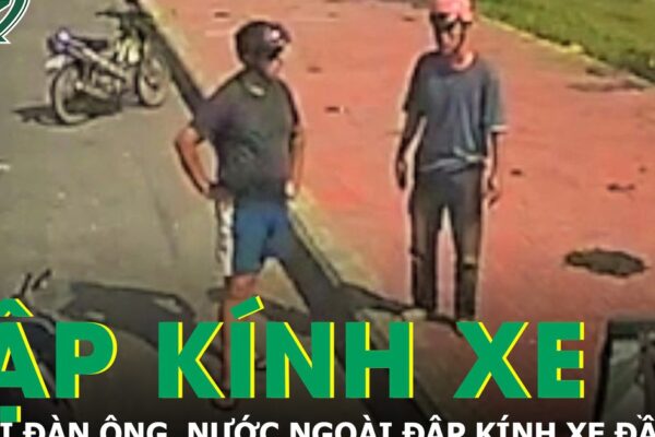 Bức xúc vì cho rằng bị ép xe, người đàn ông nước ngoài đập kính xe đầu kéo